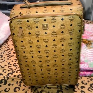MCM Monogrammed Gold Travel Bag